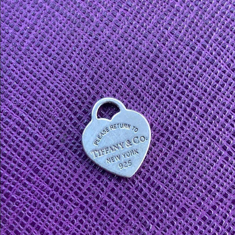 - Authentic Tiffany & Co heart charm